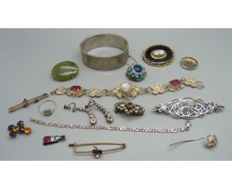 A collection of silver and other jewellery including a mourning brooch, a hardstone brooch, filigree jewellery, a Limoges bro