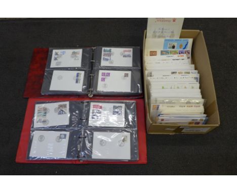 Stamps; a box of first day covers in albums and loose 