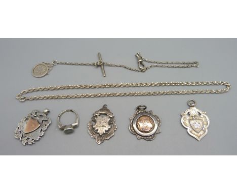 Four silver fobs, one a/f, two silver chains and a ring, 60g 