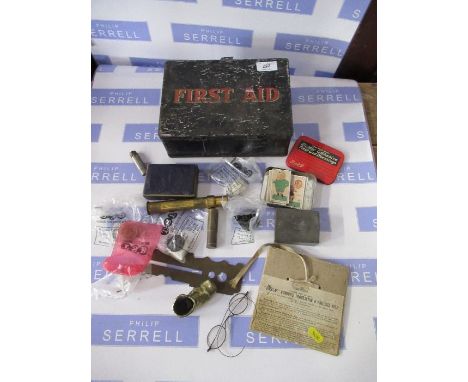 A First Aid tin and contents, including Douglas Combined protractor and rule, coins, pewter box with crest etc