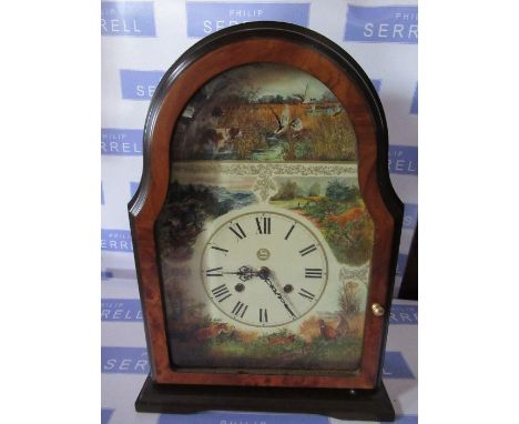 A burr wood cased mantle clock