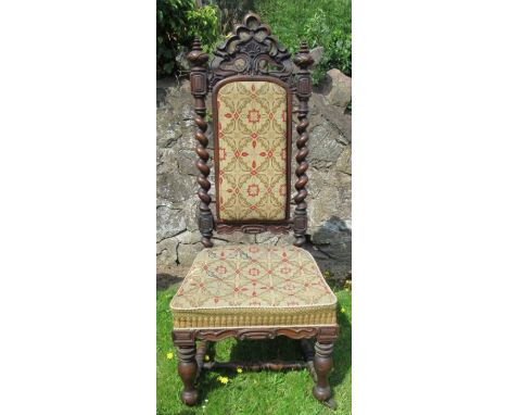 A 19th century rosewood salon chair, with barley twist supports to the back, with tapestry seat