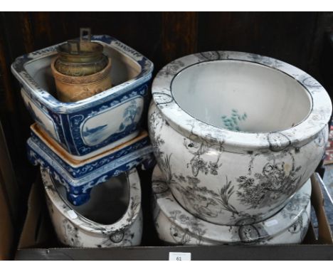 A large pair of circular planters with transfer-printed decoration, to/w an oval planter to match and a Chinese blue and whit