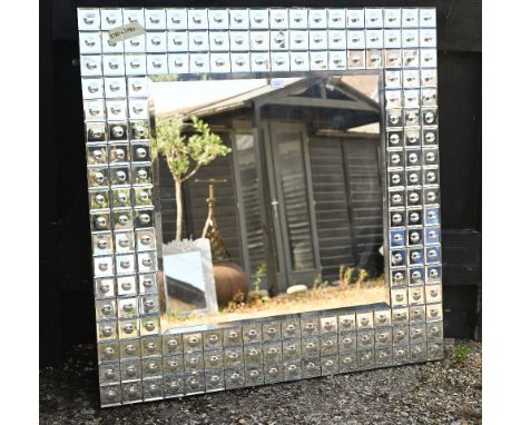 A modern bevelled mirror with bubble tile mosaic surround, 108 x 108 cm&nbsp; 