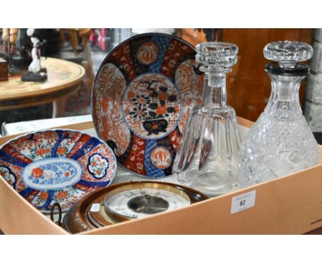 A Baccarat cut glass decanter and another decanter with silver rim, Jubilee mark London 1935, to/w two Imari dishes and an an