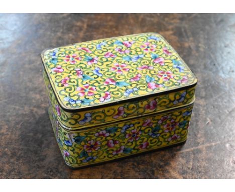 A Chinese enamel box and cover, decorated with scrolling flowers and foliage on a yellow ground, 10 x 8 x 6 cm h 
