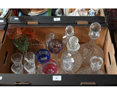 A 19th century vine-etched decanter and five other decanters, to/w six various coloured overlaid and cut wine glasses and oth