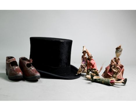 A vintage top hat by Christy's of London 55.5cm inner measurement, to/w a pair of antique child's clogs with leather uppers a