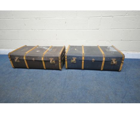 TWO VINTAGE CANVASS TRAVELING TRUNKS, with wooden banding, length 92cm x depth 54cm x height 32cm (condition report: both wit