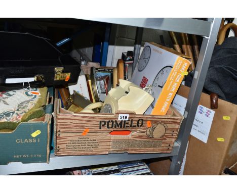 FOUR BOXES AND LOOSE MISCELLANEOUS SUNDRIES, to include two briefcase, clothing, walking sticks, umbrellas, framed prints, a 