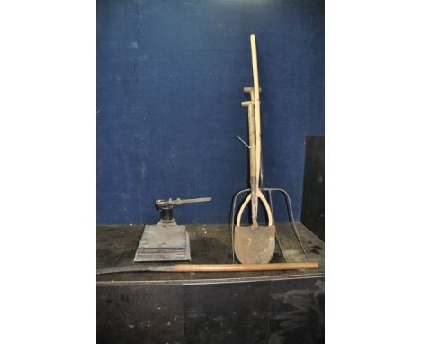 A VINTAGE BALANCE SCALE with Imperial markings (bed repaired) and four vintage gardening tools including a 14in four pronged 