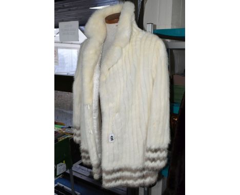 A LADIES VINTAGE WHITE FUR JACKET, 'Polar White Mink'  jacket with pale brown fur detail around cuffs and hem, UK size approx