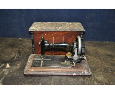 A VINTAGE PFAFF MANUAL SEWING MACHINE with distressed magogany case