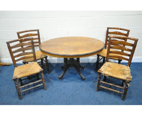 A VICTORIAN WALNUT AND INLAID OVAL TILT TOP LOO TABLE, raised on turned supports and four splayed legs, length 119cm x depth 