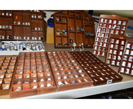 A COLLECTION OF THIMBLES, approximately three hundred and fifty to four hundred, with some wooden display cases, mainly ceram