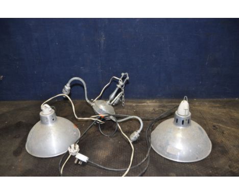 A PAIR OF VINTAGE ALUMINIUM INDUSTRIAL LIGHTS with screwfit ceramic bulb holders and a chrome three branch centre light (3)