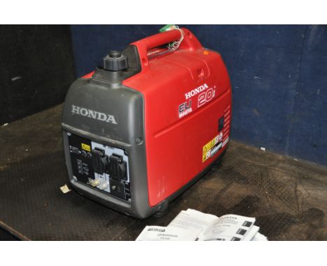 A HONDA EU20i INVERTER PETROL GENERATOR with manual (engine pulls freely but hasn't started)