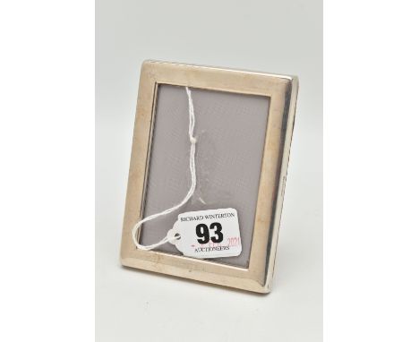 CONCORDE INTEREST - AN ELIZABETH II SILVER RECTANGULAR EASEL BACK PHOTOGRAPH FRAME, engraved 'CONCORDE' along the lower edge,