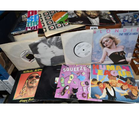 TWO CASES OF SINGLES RECORDS, approximately two hundred singles, by artists to include Duran Duran,  John Lennon, Depeche Mod