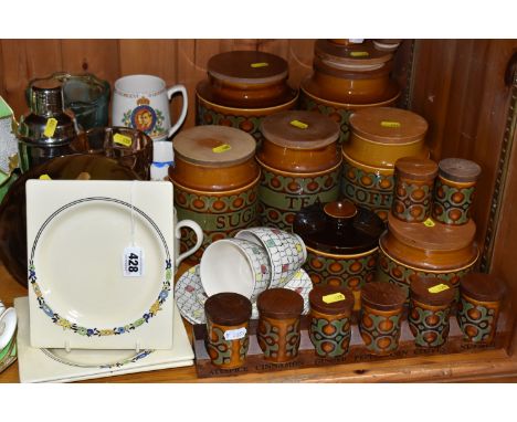 A COLLECTION OF HORNSEA 'BRONTE' DESIGN KITCHEN CANNISTERS AND CLARICE CLIFF DESIGN PLATES, comprising large Biscuits and Flo