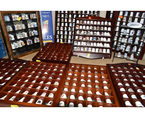A COLLECTION OF THIMBLES, approximately four hundred and fifty to five hundred, with some wooden display cases, mainly cerami