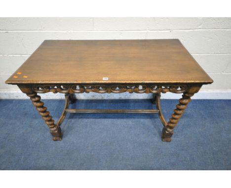 A REPRODUCTION GEORGIAN STYLE OAK CONSOLE TABLE, with a foliate carved apron, raised on barley twist supports, united by a sh