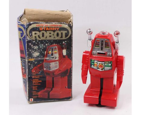 Hong Kong plastic and battery operated model of a Starry Robot, red body with missing battery box cover, in a heavily worn bo