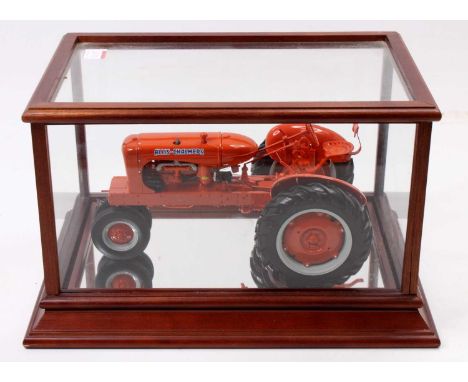 A Franklin Mint 1/12th scale Allis-Chalmers Farm Tractor housed in a glazed case - the model appears to be complete