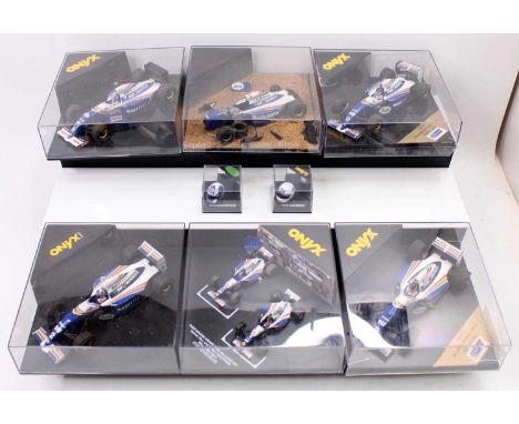 A collection of Williams Renault related 1/24 diecast and display helmets to include a Damon Hill Williams Renault FW16 No. 5