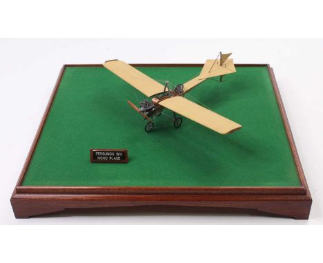 An exhibition quality wooden and hand made model of a Ferguson 1911 Monoplane handpainted with cream body, wooden components 