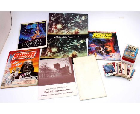 A collection of Star Wars memorabilia including 2x souvenir programmes from the first film, various collectors edition magazi