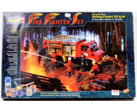A boxed Revell 1/24 scale plastic kit for Mercedes Benz Unimog U1300L fire tender with action figures and paints included