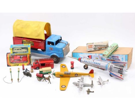 A collection of mixed tin plate plastic and diecast vehicles and accessories to include a large scale pressed steel Triang Mi