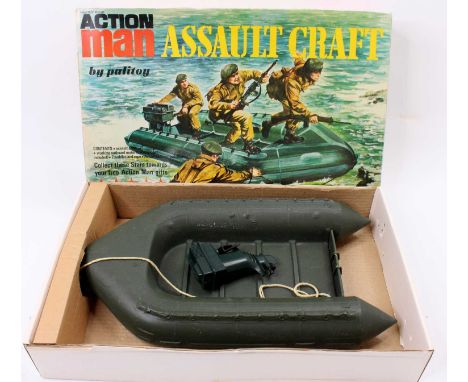 A Pallitoy Action Man boxed assault craft comprising of assault craft with powerboard motor housed in the original card box w