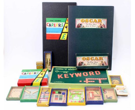 A collection of vintage games and puzzles comprising board games Oscar, Careers, and Keyword, together with a selection of ca