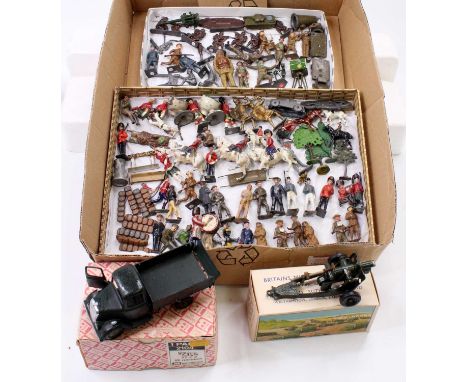 A collection of mostly Britains lead hollow cast military figures and accessories, together with a boxed Britains No. 1725 Ho