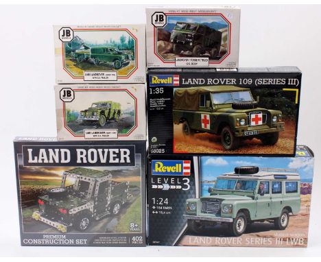 A collection of Land Rover model kits including a Revell 1/24th scale Land Rover Series III LWB, a JB Models 1/76th scale Lan