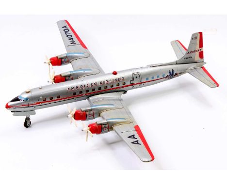 A Yonazawa of Japan tinplate and battery operated model of an American Airlines DC-7C California Flagship passenger aircraft,