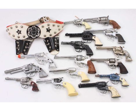 15 1950s and later children's cap guns and pistols to include a Roy Rogers Hubley Toys pistol diecast plated by Schmidt with 