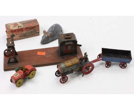 A collection of tinplate and clockwork models to include an early 20th century JHL tinplate Dynamobil powering a lineside acc