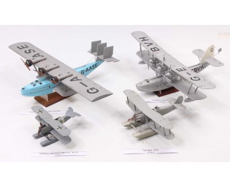 Four exhibition quality wooden and hand built 1/72 scale aircraft models to include a Short Calcutta 1928, a Hansa-Brandenbur