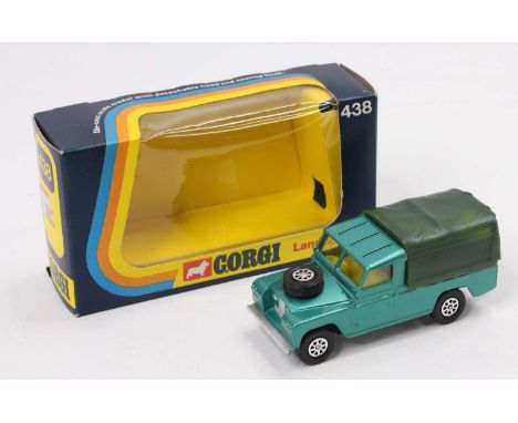 A Corgi Toys Whizzwheels No. 438 LandRover 109WB comprising a metallic green body with yellow interior, and green plastic til