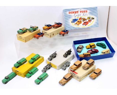 A collection of Dinky Toys original and reproduction trade boxes, some with contents to include No. 27F Estate Car with Hudso