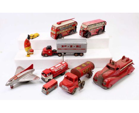 A collection of vintage tinplate including a Wells Brimtoy clockwork London bus, a Mettoy SHELL Petrol Tanker, a larger scale