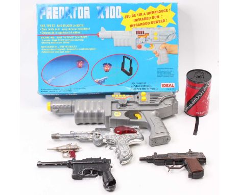 A collection of space related and special agent toy guns and electronic games to include a Space Outlaw Race Selector space g