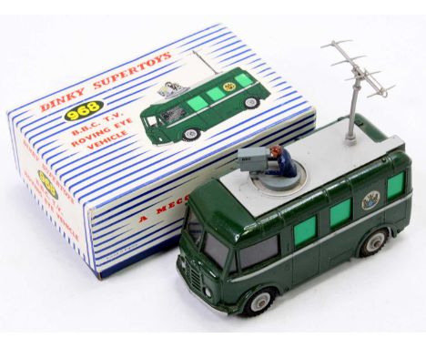 Dinky Toys No. 968 BBC TV roving eye vehicle with dark green body and grey detailing, with cameraman figure and plastic aeria