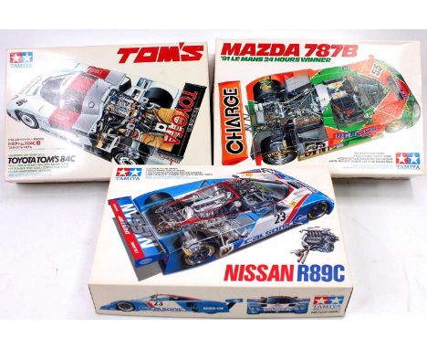 Tamiya 1/24th scale boxed plastic kit group, 3 examples to include a Mazda 787B 1991 Le Mans Race Car, a No.2453 Toyota Toms 