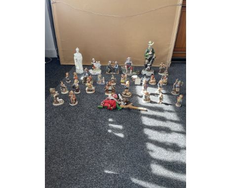 A Large Collection Of Figurines To Include Goebel Hummel Figurines, Capodimonte Along With Pelham Puppet And Other.