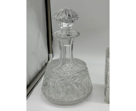 Collection of Crystal to include Decanters to include Silver Topped Decanter, Biscuit Jar, Biscuit Barrel. 
Chip to the rim o