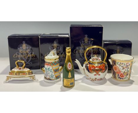 A Royal Crown Derby miniature model, Ice Bucket, 6cm high; others, Champagne bottle, 9cm high, Iron, ‘Imari’ pattern, a Milk 